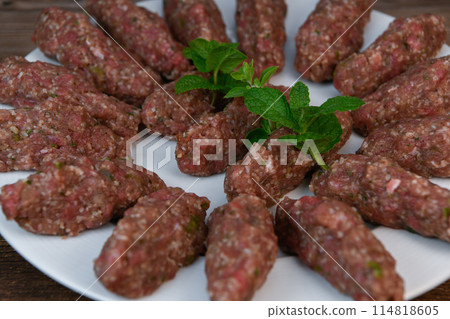 RECIPE FOR LEBANESE KEBBE NAYYHE, RAW MINCED BEEF, MARJORAM, MINT, ONIONS, CRUSHED WHEAT, SEVEN RECIPE FOR LEBANESE KEBBE NAYYHE, RAW MINCED BEEF, MARJORAM, MINT, ONIONS, CRUSHED WHEAT, SEVEN 114818605