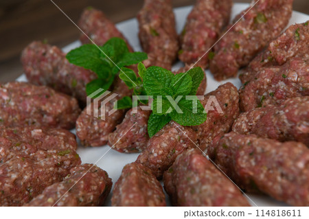 RECIPE FOR LEBANESE KEBBE NAYYHE, RAW MINCED BEEF, MARJORAM, MINT, ONIONS, CRUSHED WHEAT, SEVEN RECIPE FOR LEBANESE KEBBE NAYYHE, RAW MINCED BEEF, MARJORAM, MINT, ONIONS, CRUSHED WHEAT, SEVEN 114818611