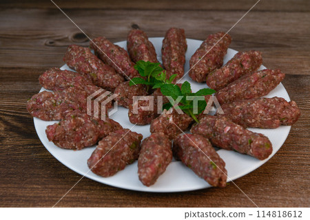 RECIPE FOR LEBANESE KEBBE NAYYHE, RAW MINCED BEEF, MARJORAM, MINT, ONIONS, CRUSHED WHEAT, SEVEN 114818612