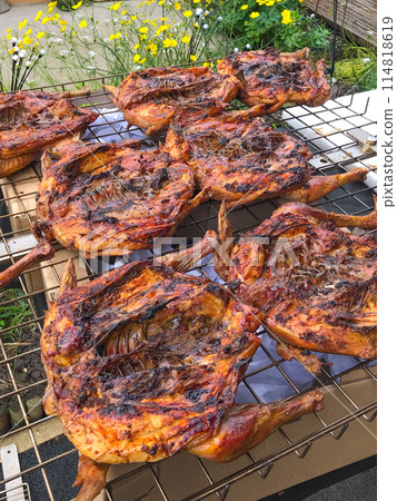 Delicious chickens wings and lamb barbecue on hot grill Delicious chickens wings and lamb barbecue on hot grill 114818619