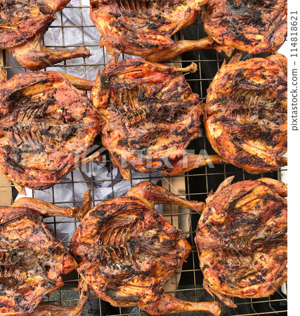 Delicious chickens wings and lamb barbecue on hot grill 114818621