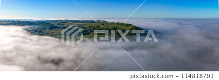 Aerial view of Bordeaux vineyard at sunrise spring under fog, Sainte-Croix-du-Mont, Gironde, France 114818701