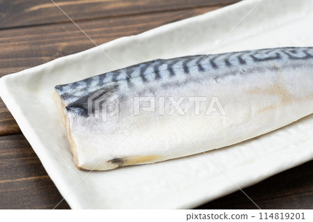 Frozen mackerel on wood background Frozen mackerel on wood background 114819201