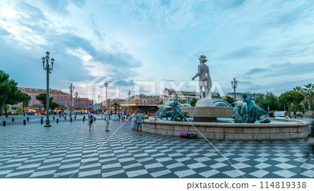 The Fountain du Soleil on Place Massena square Nice day to night timelapse, French Riviera, Cote d'Azur, France The Fountain du Soleil on Place Massena square Nice day to night timelapse, French Riviera, Cote d'Azur, France 114819338