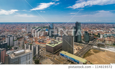 Milan aerial view of modern towers and skyscrapers and the Garibaldi railway station in the business district timelapse Milan aerial view of modern towers and skyscrapers and the Garibaldi railway station in the business district timelapse 114819372