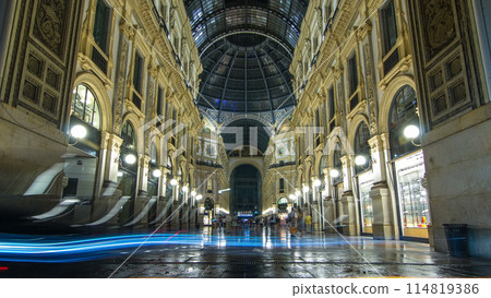 Entrance to the Galleria Vittorio Emanuele II timelapse from Via Tommaso Grossi at night. 114819386
