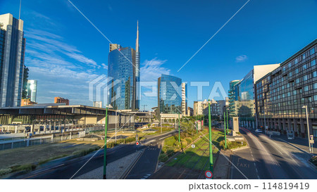 Milan skyline with modern skyscrapers in Porta Nuova business district timelapse hyperlapse in Milan, Italy, at sunset. Milan skyline with modern skyscrapers in Porta Nuova business district timelapse hyperlapse in Milan, Italy, at sunset. 114819419