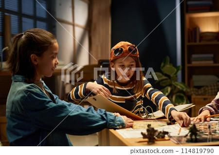 Moving chip along board with figurines Moving chip along board with figurines 114819790