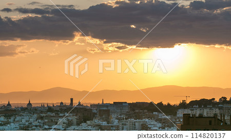 Panoramic sunset timelapse View of Madrid, Spain from the hills of Tio Pio Park, Vallecas-Neighborhood. Panoramic sunset timelapse View of Madrid, Spain from the hills of Tio Pio Park, Vallecas-Neighborhood. 114820137