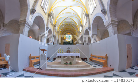 Church of the Nativity interior with altar and icon lamps hanging on long chain in Bethlehem timelapse hyperlapse. Church of the Nativity interior with altar and icon lamps hanging on long chain in Bethlehem timelapse hyperlapse. 114820175