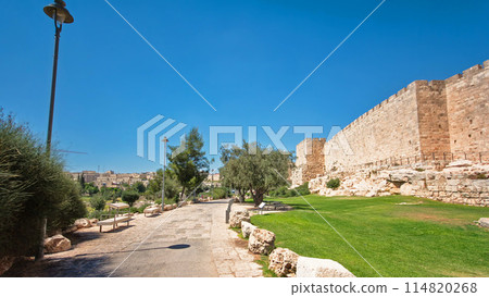 Defensive wall of the ancient holy Jerusalem timelapse hyperlapse, lit by the bright sun. Defensive wall of the ancient holy Jerusalem timelapse hyperlapse, lit by the bright sun. 114820268