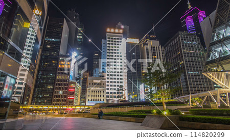 Night view hyperlapse of modern city in park with fountain and skyscrapers around. Time lapse. Hong Kong Night view hyperlapse of modern city in park with fountain and skyscrapers around. Time lapse. Hong Kong 114820299