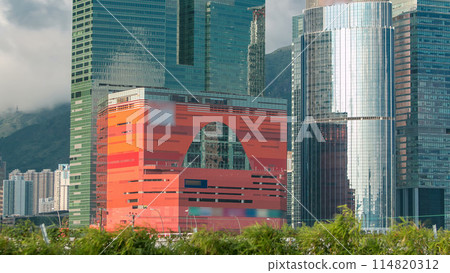 City office towers and shopping mall from the port of Hong Kong timelapse. 114820312