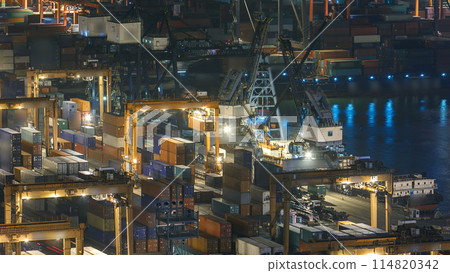 Hong Kong Container Terminal in port at night timelapse 114820342