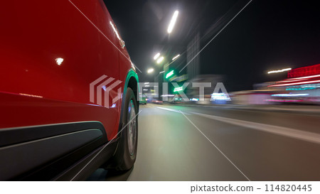 Drivelapse urban look from fast driving car at a night avenue in a city timelapse hyperlapse Drivelapse urban look from fast driving car at a night avenue in a city timelapse hyperlapse 114820445