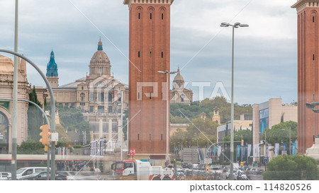 Cityscape view of Placa d'Espanya or Spain square, with the Venetian Towers and the National Art Museum timelapse 114820526
