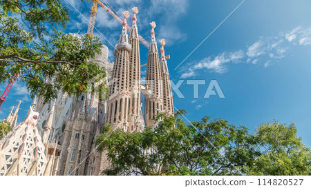 Sagrada Familia, a large Roman Catholic church in Barcelona, Spain timelapse Sagrada Familia, a large Roman Catholic church in Barcelona, Spain timelapse 114820527