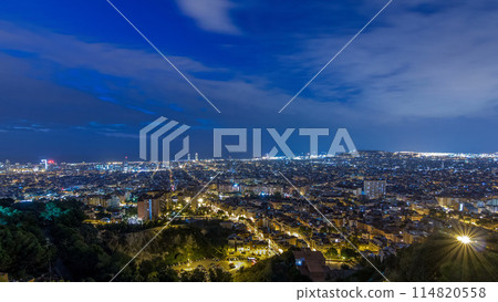 Panorama of Barcelona night to day timelapse, Spain, viewed from the Bunkers of Carmel Panorama of Barcelona night to day timelapse, Spain, viewed from the Bunkers of Carmel 114820558