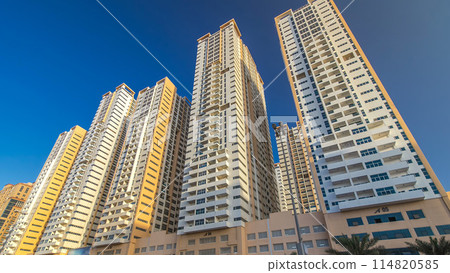 Modern new towers in Ajman timelapse hyperlapse. Cityscape of Ajman. Modern new towers in Ajman timelapse hyperlapse. Cityscape of Ajman. 114820585