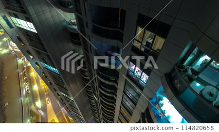 Cityscape of Ajman from rooftop night aerial timelapse Cityscape of Ajman from rooftop night aerial timelapse 114820658