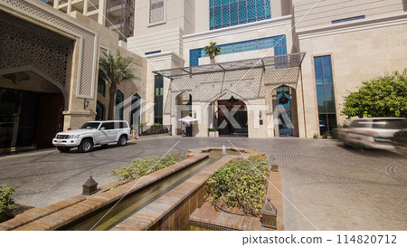 Building of luxurious 5-star hotel in Ajman timelapse nestled near the turquoise waters of Arabian Gulf. 114820712