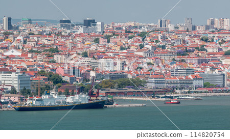 Panorama of Lisbon historical centre aerial timelapse viewed from above the southern margin of the Tagus or Tejo River. Panorama of Lisbon historical centre aerial timelapse viewed from above the southern margin of the Tagus or Tejo River. 114820754