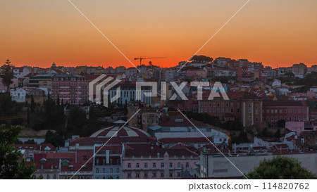 Sunrise over Lisbon aerial cityscape skyline timelapse from viewpoint of St. Peter of Alcantara, Portugal. Sunrise over Lisbon aerial cityscape skyline timelapse from viewpoint of St. Peter of Alcantara, Portugal. 114820762