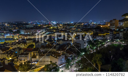Lisbon aerial view of city centre with illuminated building at night timelapse, Portugal 114820782