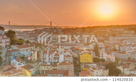 Lisbon at sunset aerial panoramic view of city centre with red roofs at autumn evening timelapse, Portugal Lisbon at sunset aerial panoramic view of city centre with red roofs at autumn evening timelapse, Portugal 114820810