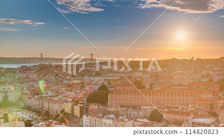 Lisbon at sunset aerial panorama view of city centre with red roofs at Autumn evening timelapse, Portugal 114820823