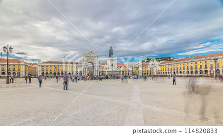 Triumphal arch at Rua Augusta and bronze statue of King Jose I at Commerce square timelapse hyperlapse in Lisbon, Portugal. 114820833