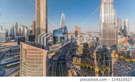 Panoramic skyline view of Dubai downtown with mall, fountains and skyscrapers aerial timelapse 114820927