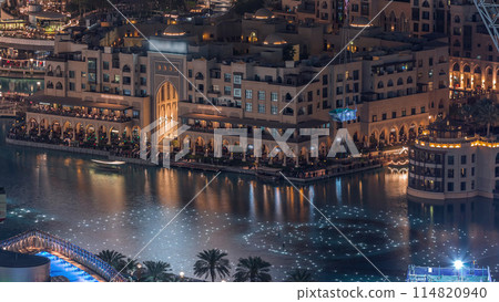 Unique view of Dubai Dancing Fountain show at night timelapse. Unique view of Dubai Dancing Fountain show at night timelapse. 114820940