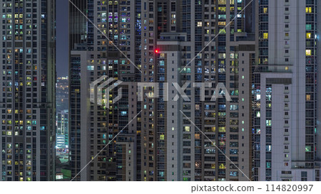 Lights from windows of offices in Dubai Aerial Timelapse 114820997