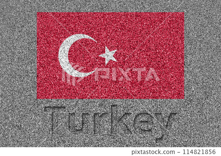 The Turkish flag painted on a stone slab with the word "Turkey" carved into it 114821856