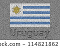 The Uruguayan flag painted on a stone slab with the word "Uruguay" carved into it 114821862