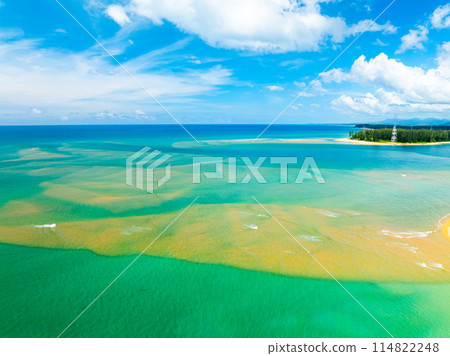 Aerial view of a blue sea surface water texture background,Sun reflections over ocean, Aerial flying drone view Waves water surface texture on sunny tropical ocean in Phuket island Thailand Aerial view of a blue sea surface water texture background,Sun reflections over ocean, Aerial flying drone view Waves water surface texture on sunny tropical ocean in Phuket island Thailand 114822248