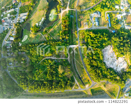 Aerial view drone shot of beautiful green golf field at Phuket island Thailand,Wide angle Top view golf course Aerial view drone shot of beautiful green golf field at Phuket island Thailand,Wide angle Top view golf course 114822291