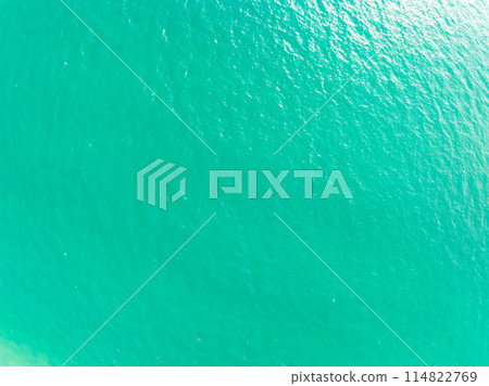 Sea surface aerial view,Bird eye view photo of blue waves and water surface texture, Blue sea background, Beautiful nature, Amazing view sea background Sea surface aerial view,Bird eye view photo of blue waves and water surface texture, Blue sea background, Beautiful nature, Amazing view sea background 114822769