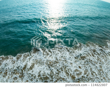Sea surface aerial view,Bird eye view photo of blue waves and water surface texture, Blue sea background, Beautiful nature, Amazing view sea background 114822807
