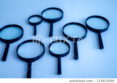 Several black magnifying glasses 114823099