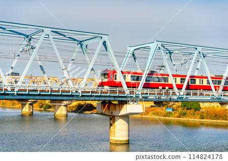 Keihin Kyubin crossing the Tamagawa River 114824178