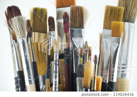 Assortment of various types and sizes of paintbrushes 114826416