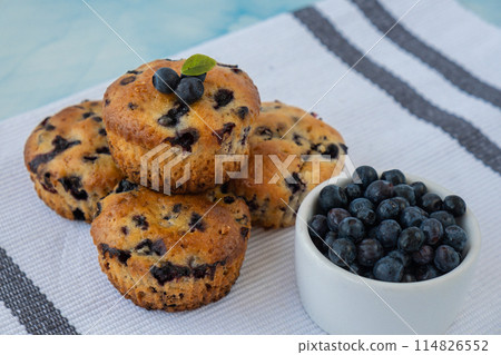 Homemade baked blueberry muffins with fresh blackberries. Tasty pastry sweet cupcake dessert. Berry pie cupcakes with organic berries. Gluten free healthcare recipe from alternative flour Homemade baked blueberry muffins with fresh blackberries. Tasty pastry sweet cupcake dessert. Berry pie cupcakes with organic berries. Gluten free healthcare recipe from alternative flour 114826552