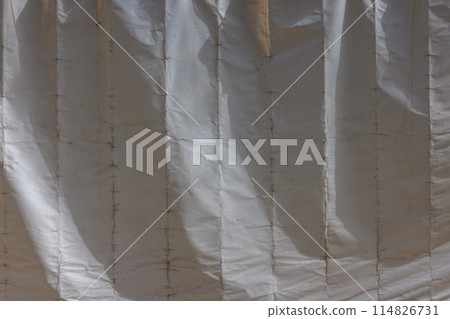Old cracked white building cover tarp, full-frame background and texture 114826731