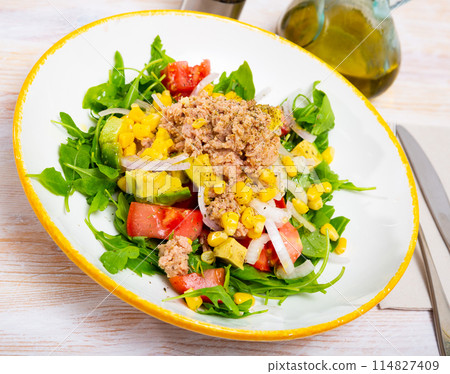 Appetizing fish salad with canned tuna Appetizing fish salad with canned tuna 114827409