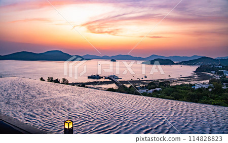 View of Cape Panwa beach at sunset, in Phuket, Thailand View of Cape Panwa beach at sunset, in Phuket, Thailand 114828823