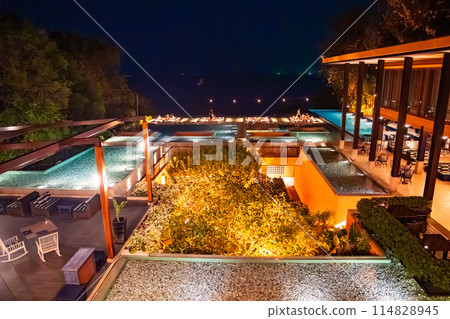 View of resort in Panwa beach at sunset, in Phuket, Thailand View of resort in Panwa beach at sunset, in Phuket, Thailand 114828945
