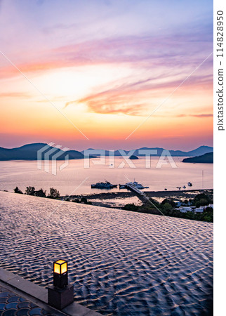View of Cape Panwa beach at sunset, in Phuket, Thailand View of Cape Panwa beach at sunset, in Phuket, Thailand 114828950