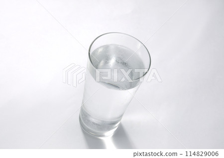 Water poured into a glass 114829006